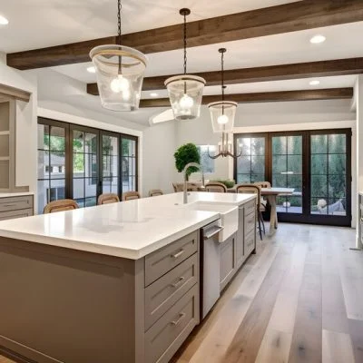 Two-tone kitchen cabinets with navy island and white uppers